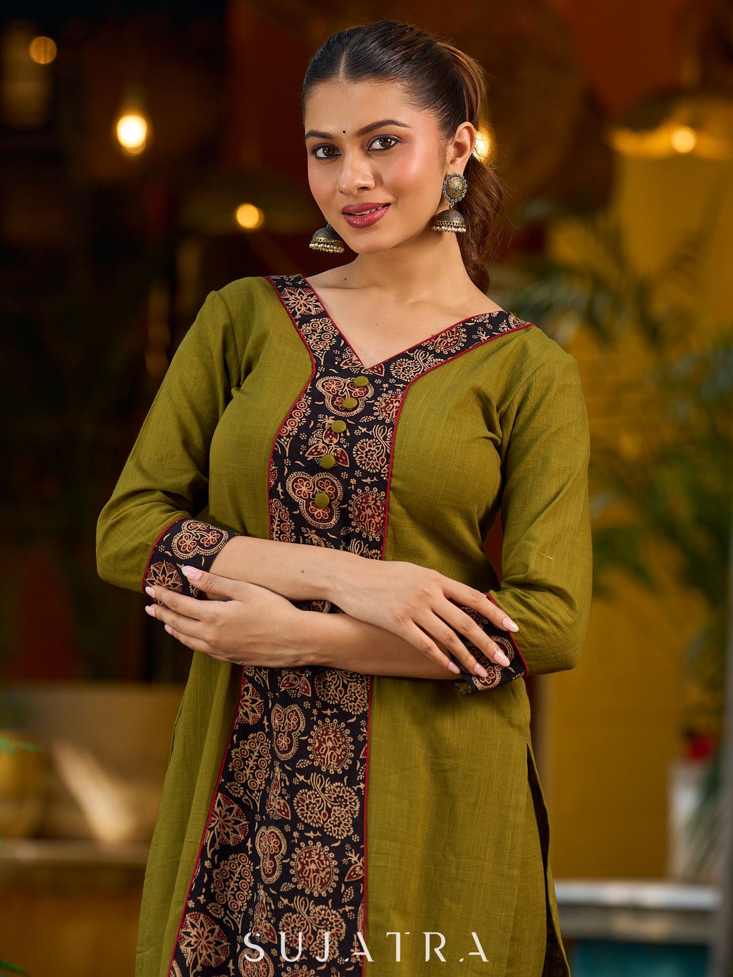 Olive kurta elevated with a black Ajrakh centre panel and Maroon details