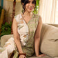 Jaipur-printed sleeveless dress featuring a half-and-half butta and jaal combination, designed with an overlapping silhouette, soft drop shoulders, and wooden accents for an artisanal, contemporary look.