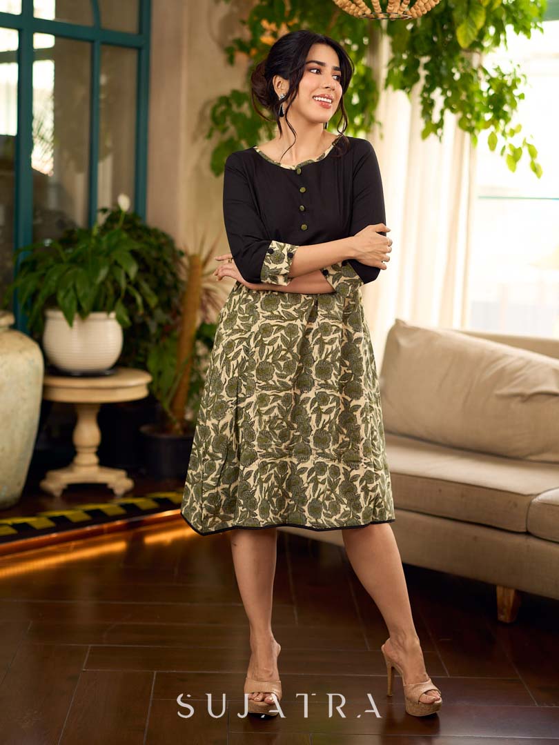 Olive floral dress featuring a contrasting black yoke, designed in a straight fit and highlighted with subtle floral accents for a clean, elegant earthy look