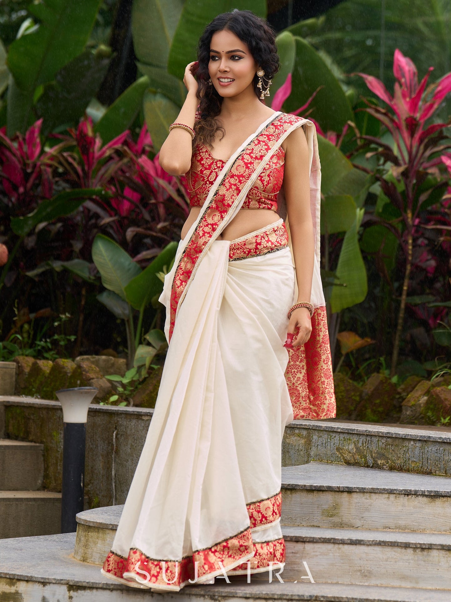 Ivory elegance with royal red Banarasi border, timeless festive glamour