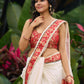 Ivory elegance with royal red Banarasi border, timeless festive glamour