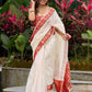 Ivory elegance with royal red Banarasi border, timeless festive glamour