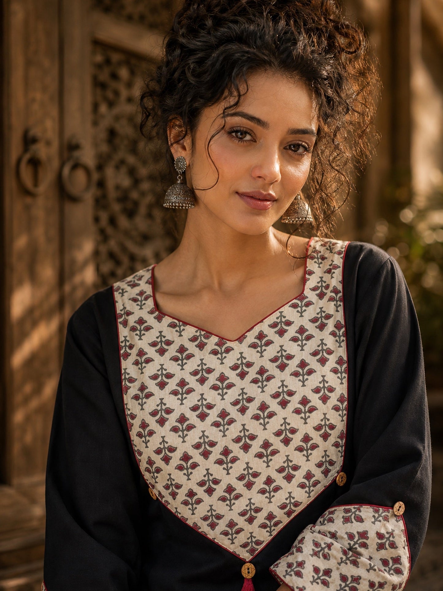 Black Cotton Kurta with Ajrakh Printed Yoke & Matching Cuffs with Minimal Embellishment