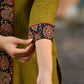 Olive kurta elevated with a black Ajrakh centre panel and Maroon details
