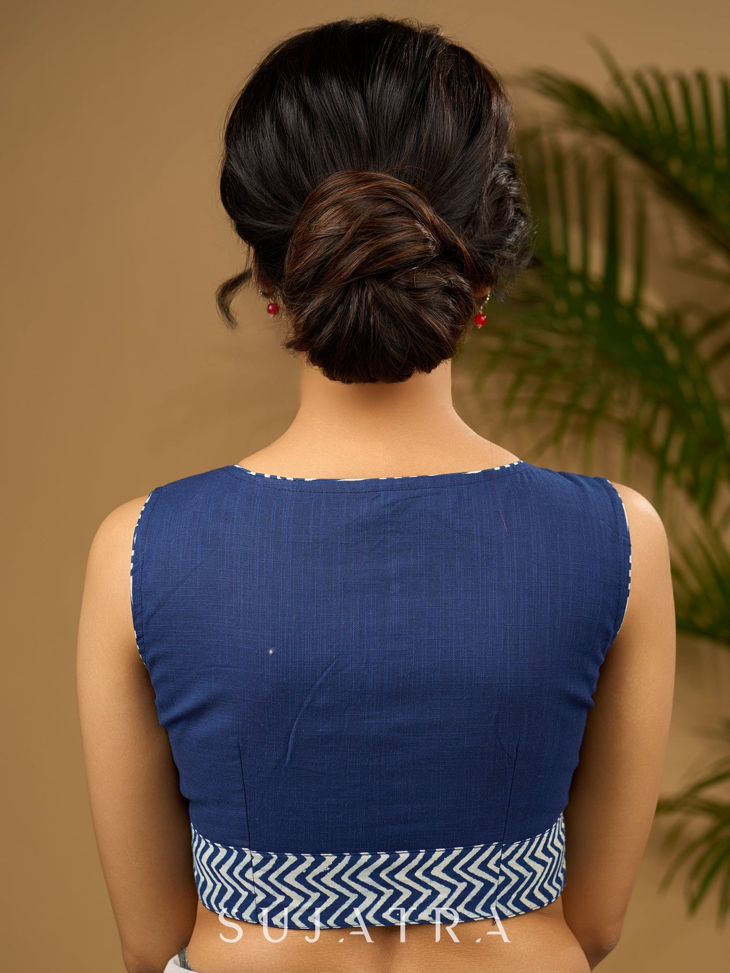Unique indigo patchwork cotton sleeveless blouse.