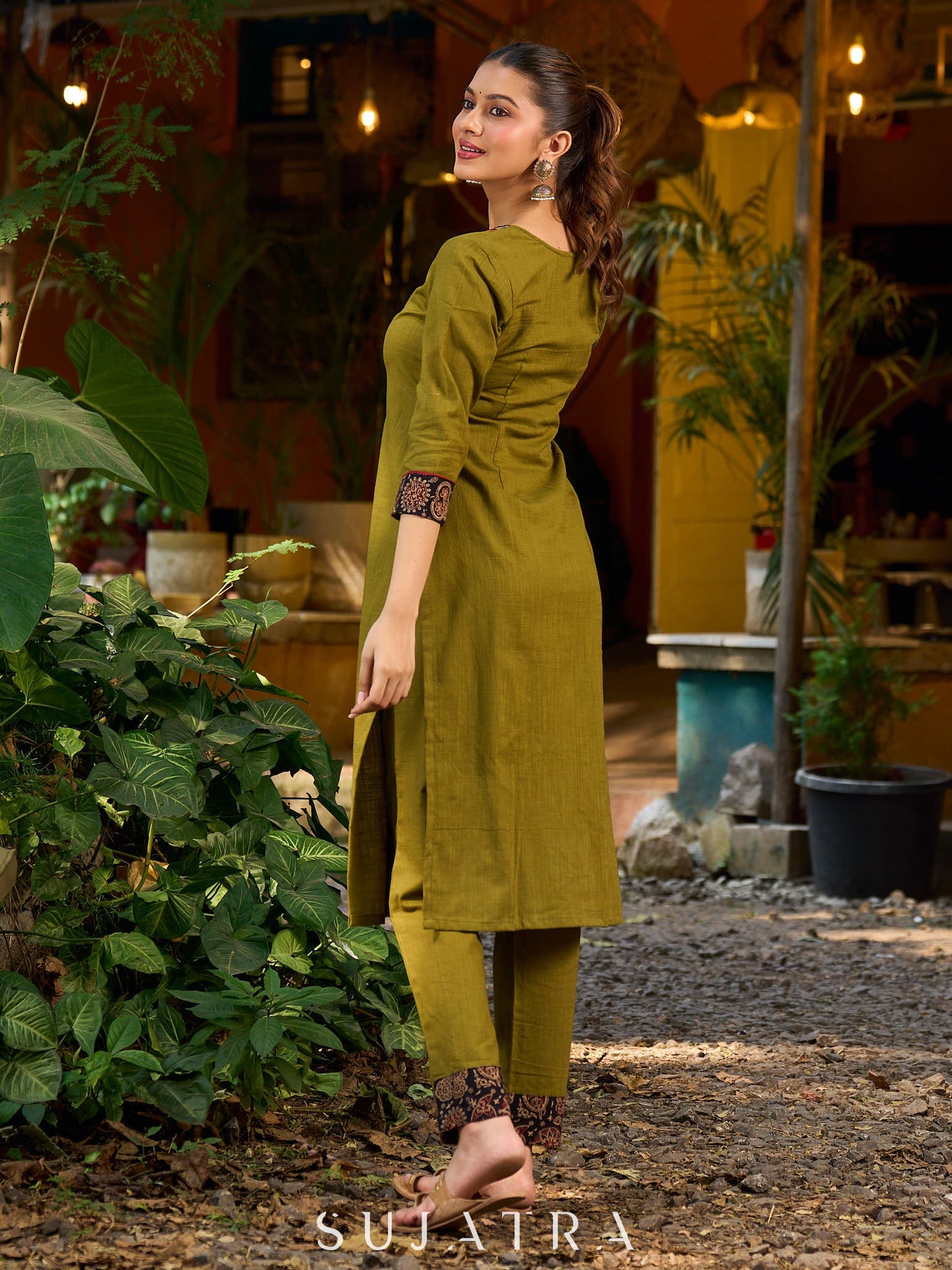 Olive kurta elevated with a black Ajrakh centre panel and Maroon details