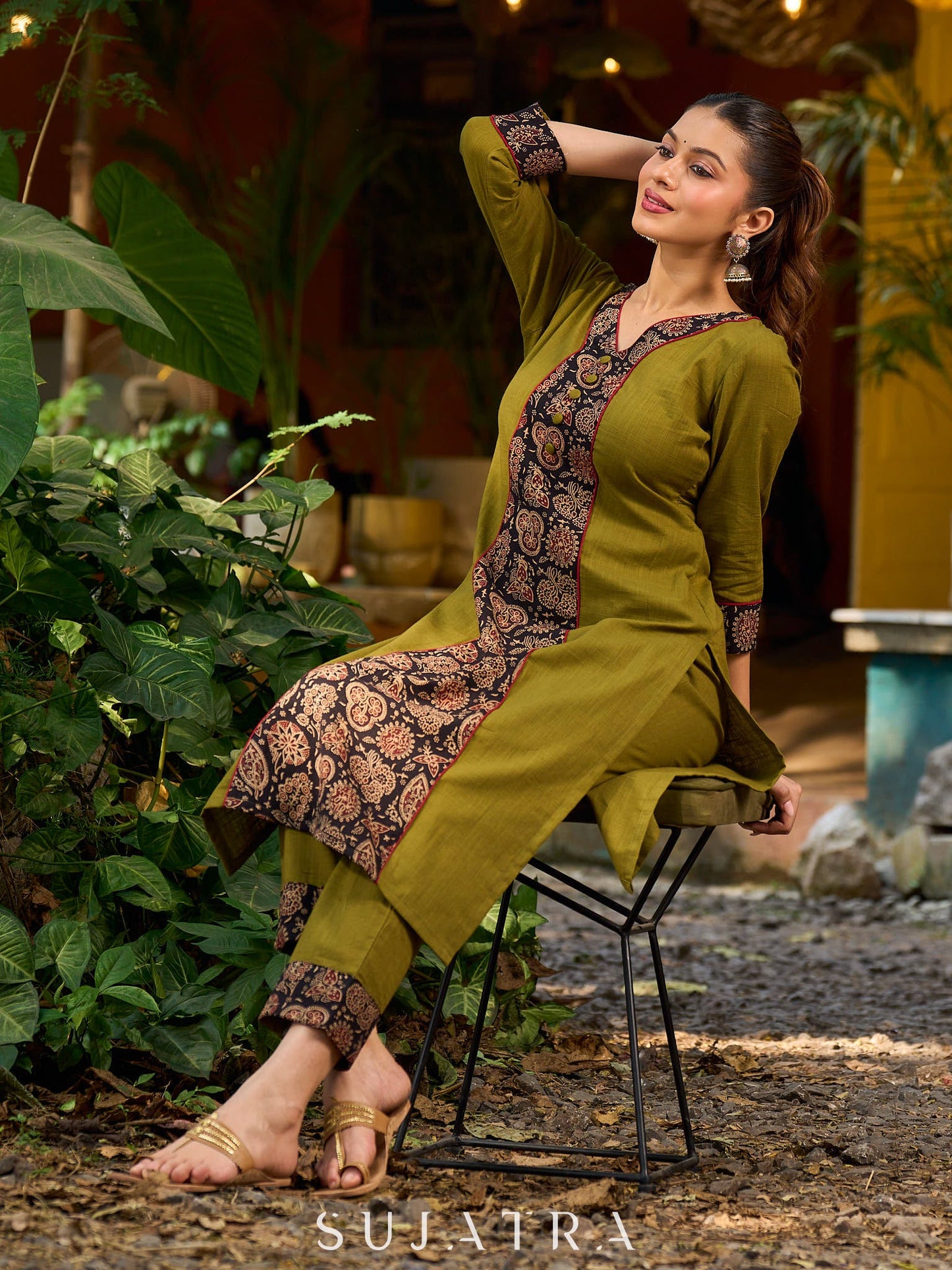 Olive kurta elevated with a black Ajrakh centre panel and Maroon details