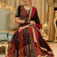 Handcrafted maroon & black Ajrakh print lehenga paired with an embroidered blouse for rich artisanal look - Dupatta Optional