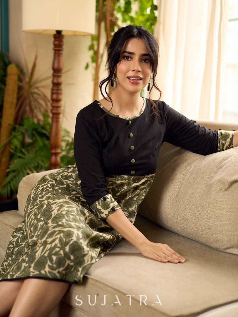 Olive floral dress featuring a contrasting black yoke, designed in a straight fit and highlighted with subtle floral accents for a clean, elegant earthy look