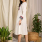 Elegant ivory dress featuring bold block print artistry with geometric charm
