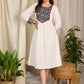 Elegant ivory dress featuring bold block print artistry with geometric charm