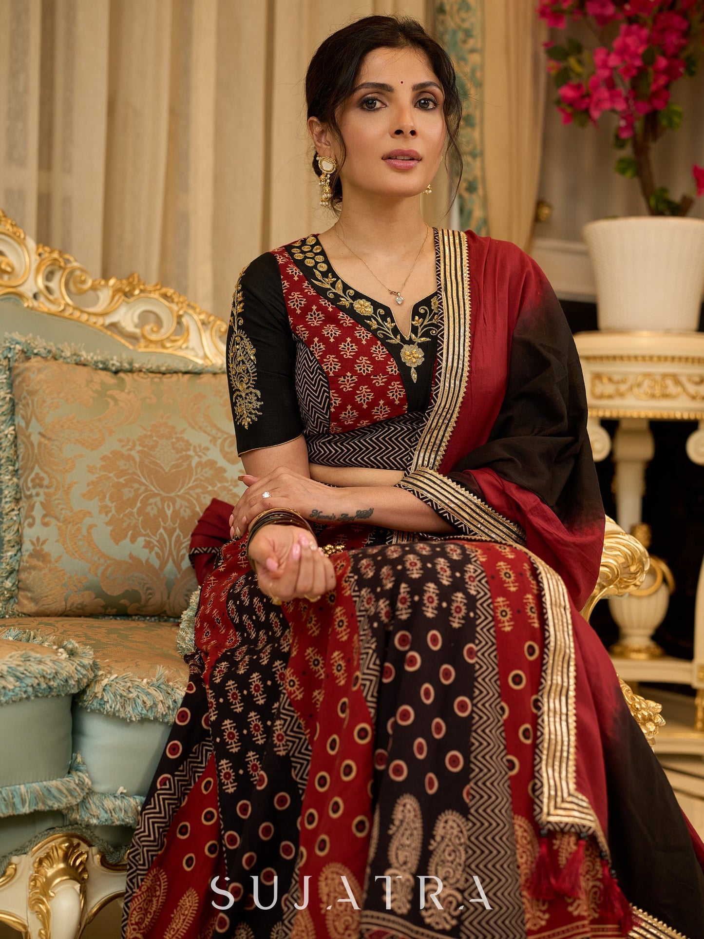 Handcrafted maroon & black Ajrakh print lehenga paired with an embroidered blouse for rich artisanal look - Dupatta Optional