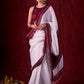 Graceful White Mul Cotton Saree with Ikat-Jamdani Border & Sparkling Mirror Lace Detailing