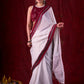 Graceful White Mul Cotton Saree with Ikat-Jamdani Border & Sparkling Mirror Lace Detailing