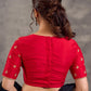 Blouse en soie et coton rouge avec broderies zari dorées et décolleté en V profond