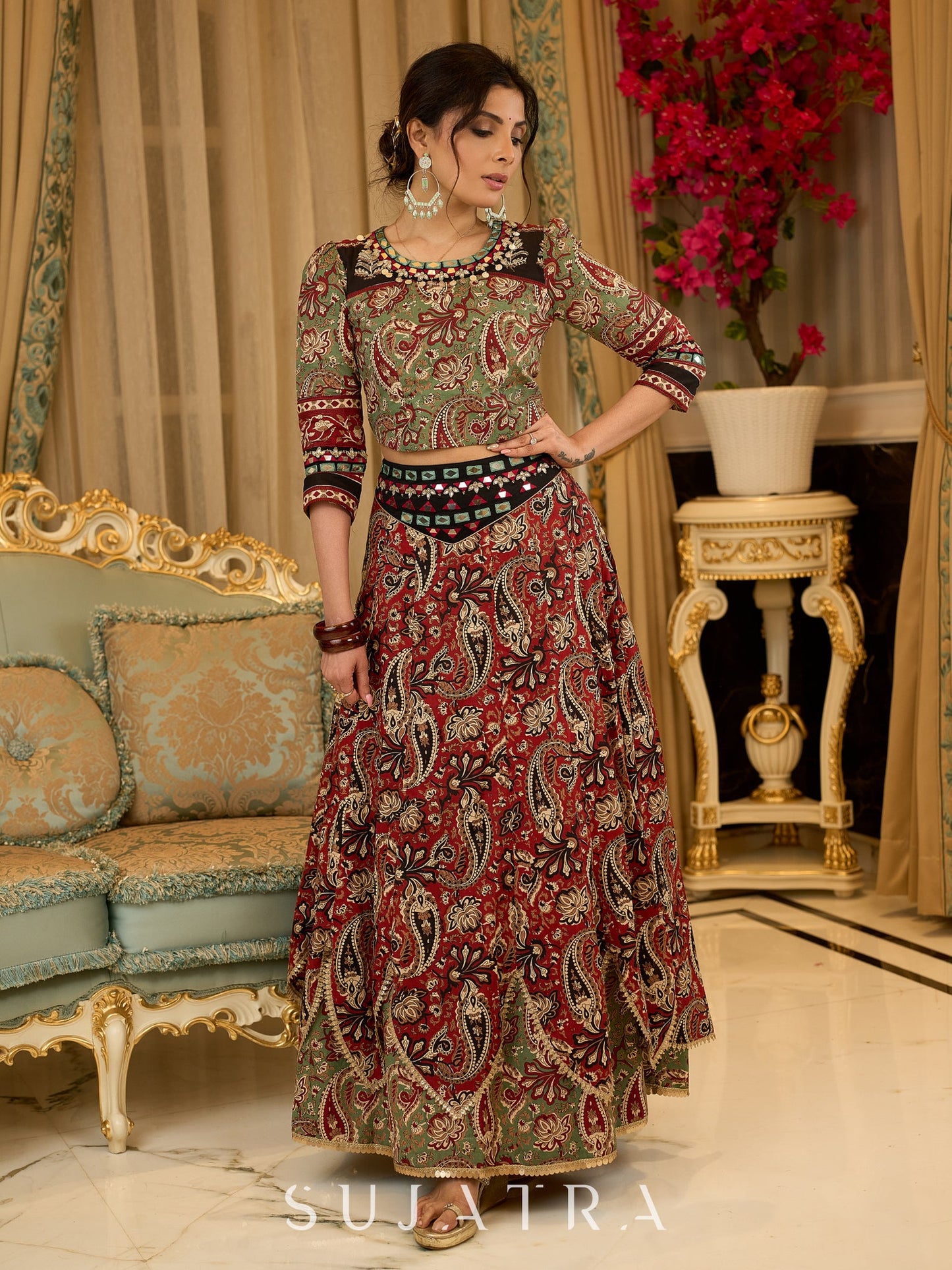 Contemporary folkloric ensemble featuring a petal cut block printed lehenga with mirror work accents  - Embroidered Dupatta Optional