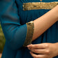 Exclusive turquoise georgette front pleated Co ord set with gold sequence work