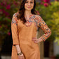 Elegant mustard kurta featuring Kalamkari print in an asymmetrical layout