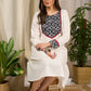 Elegant ivory dress featuring bold block print artistry with geometric charm