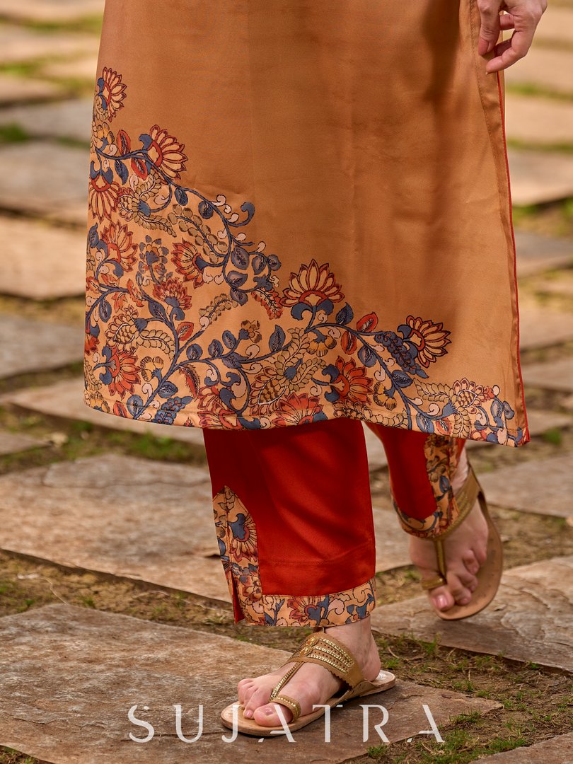 Elegant mustard kurta featuring Kalamkari print in an asymmetrical layout