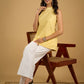 Stylish halter neck top crafted in soft yellow hakoba .