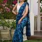 Hand block printed cotton saree in blue symphony and striking motifs