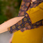 Bright Mustard Cotton Straight Kurta with Dark Blue Floral Yoke Detail
