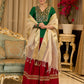 A traditional look featuring a red Cotton silk lehenga with a green Cotton silk choli with brocade yoke  - Contrast dupatta optional