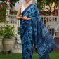 Hand block printed cotton saree in blue symphony and striking motifs