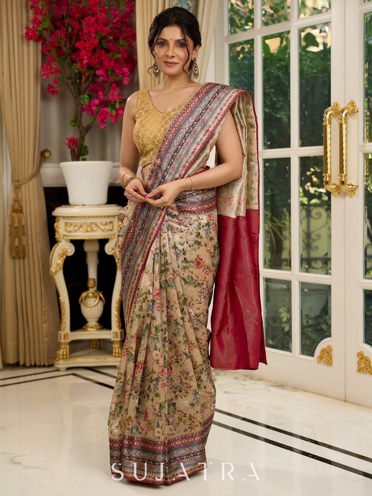 Graceful floral printed saree with intricate border, ideal for weddings and celebrations