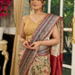 Graceful floral printed saree with intricate border, ideal for weddings and celebrations
