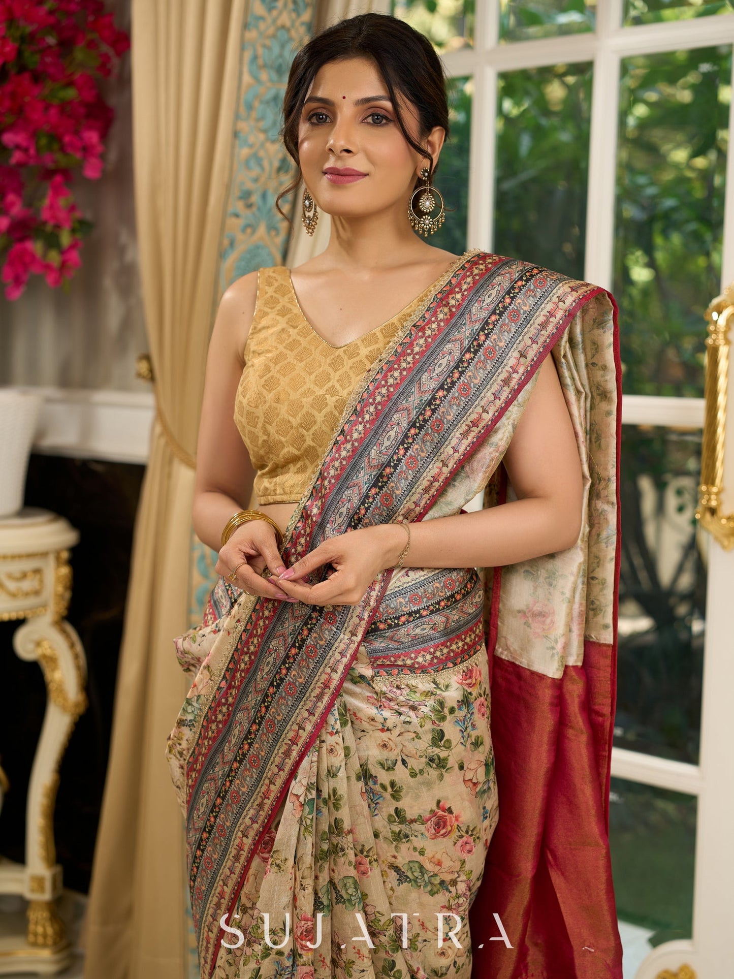 Graceful floral printed saree with intricate border, ideal for weddings and celebrations