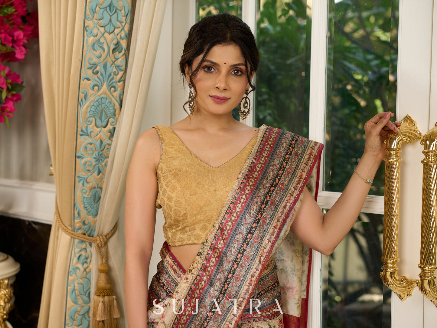 Graceful floral printed saree with intricate border, ideal for weddings and celebrations