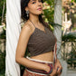 Earthy block-printed cotton saree with paisley charm and rustic elegance