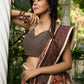 Earthy block-printed cotton saree with paisley charm and rustic elegance
