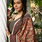 Earthy block-printed cotton saree with paisley charm and rustic elegance