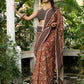 Earthy block-printed cotton saree with paisley charm and rustic elegance
