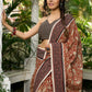 Earthy block-printed cotton saree with paisley charm and rustic elegance