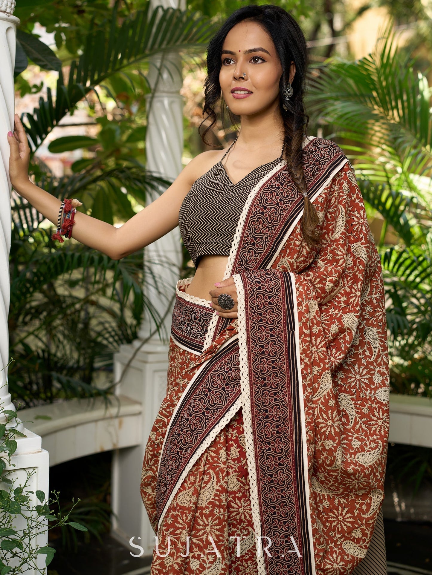 Earthy block-printed cotton saree with paisley charm and rustic elegance