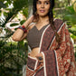 Earthy block-printed cotton saree with paisley charm and rustic elegance