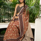 Earthy block-printed cotton saree with paisley charm and rustic elegance