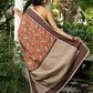 Earthy block-printed cotton saree with paisley charm and rustic elegance