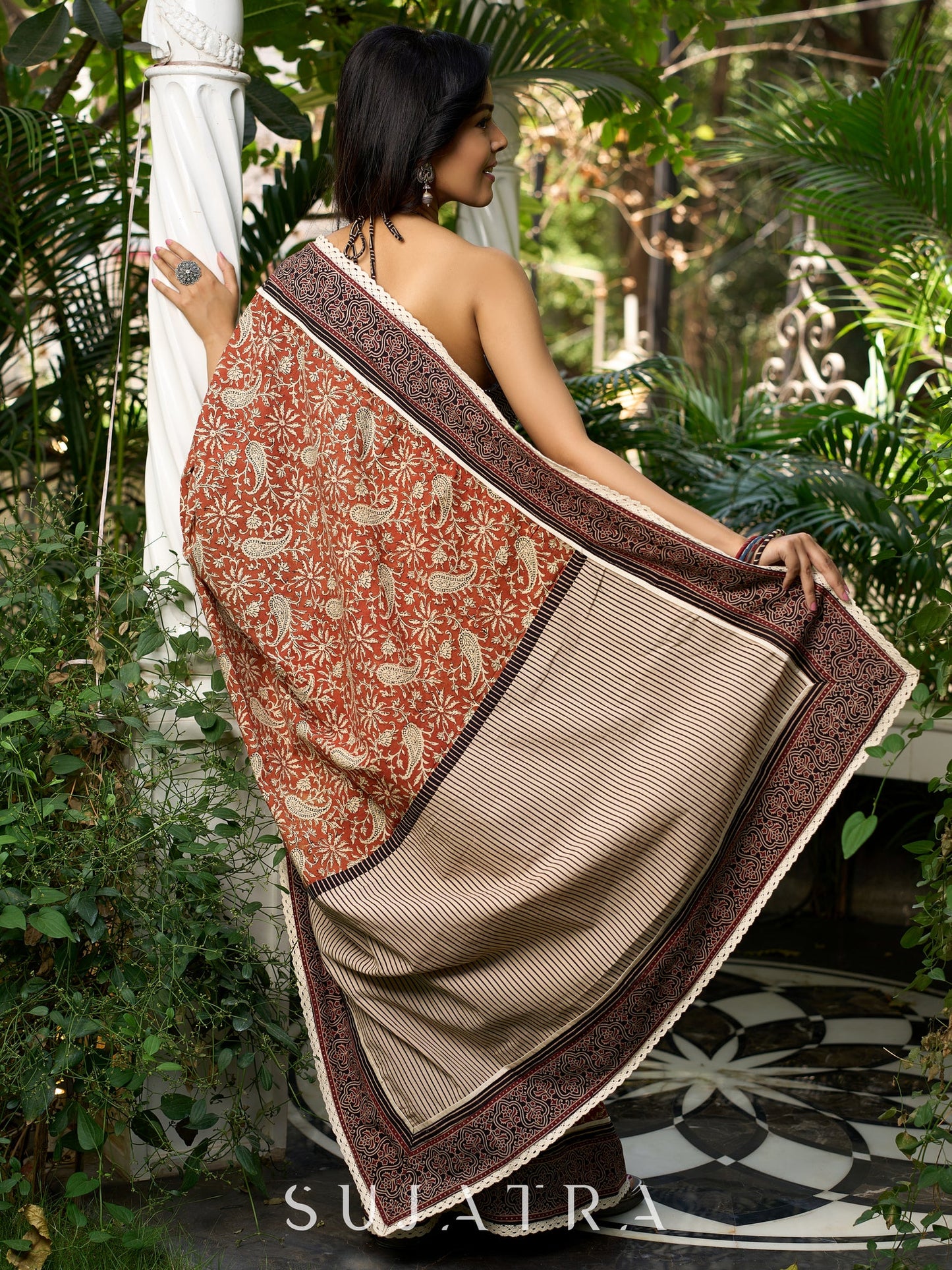 Earthy block-printed cotton saree with paisley charm and rustic elegance