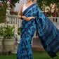 Hand block printed cotton saree in blue symphony and striking motifs
