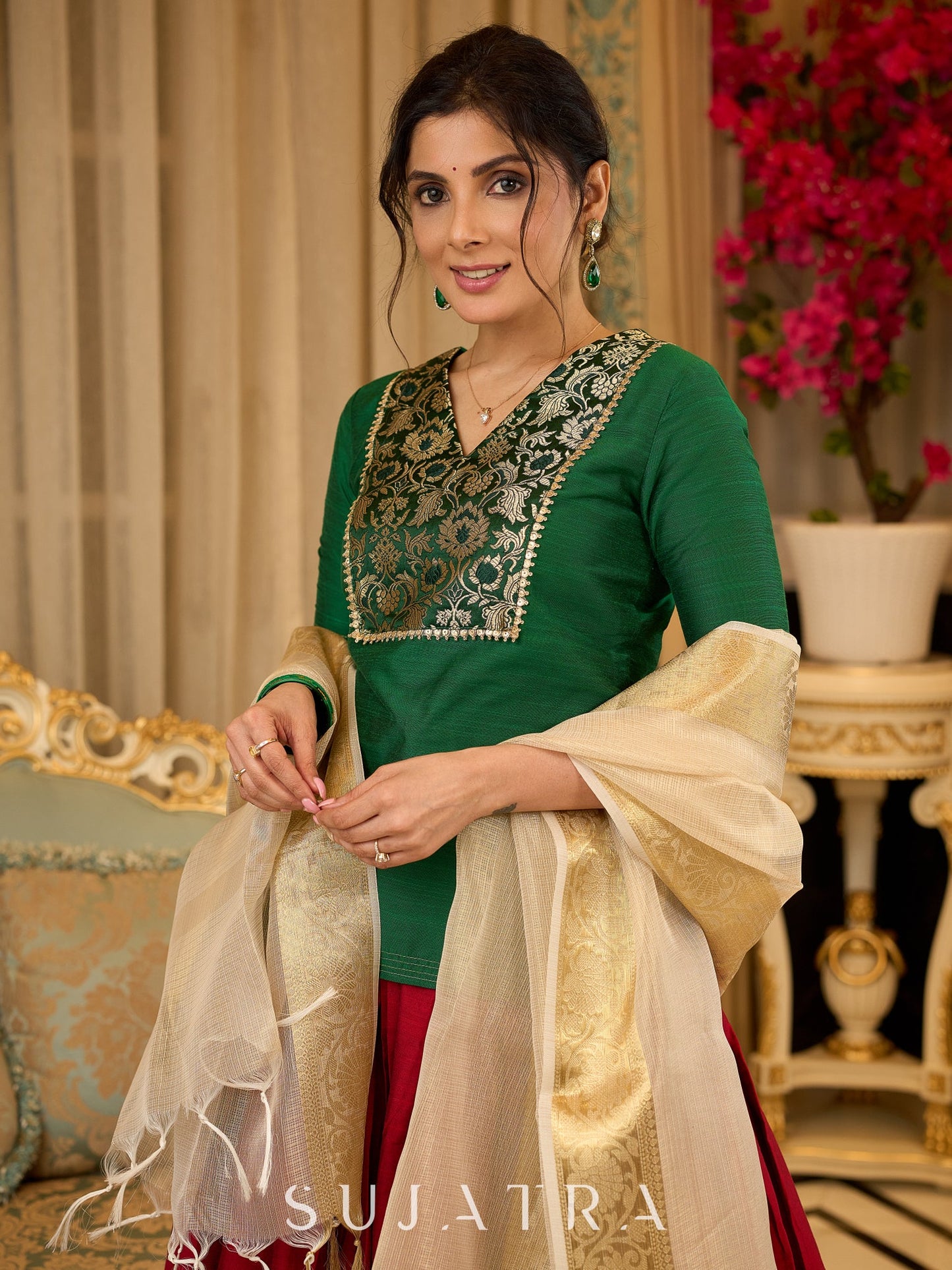 A traditional look featuring a red Cotton silk lehenga with a green Cotton silk choli with brocade yoke  - Contrast dupatta optional