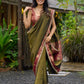 Regal olive tissue saree enhanced by intricate Banarasi brocade border