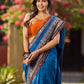 Elegant Blue Saree with Geometric Kalamkari Border and Contrasting Orange Accents