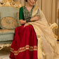 A traditional look featuring a red Cotton silk lehenga with a green Cotton silk choli with brocade yoke  - Contrast dupatta optional
