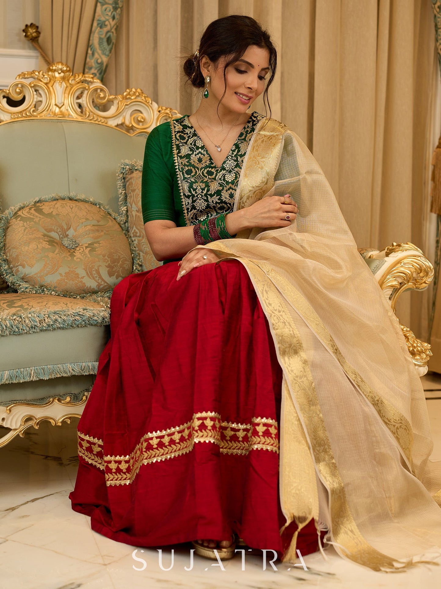 A traditional look featuring a red Cotton silk lehenga with a green Cotton silk choli with brocade yoke  - Contrast dupatta optional