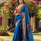 Elegant Blue Saree with Geometric Kalamkari Border and Contrasting Orange Accents